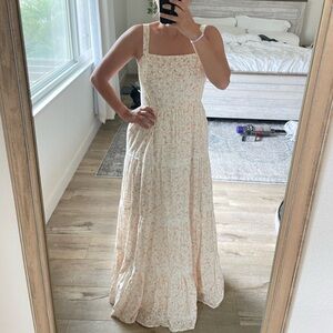 Only worn once Aura dress. White with peach flowers.